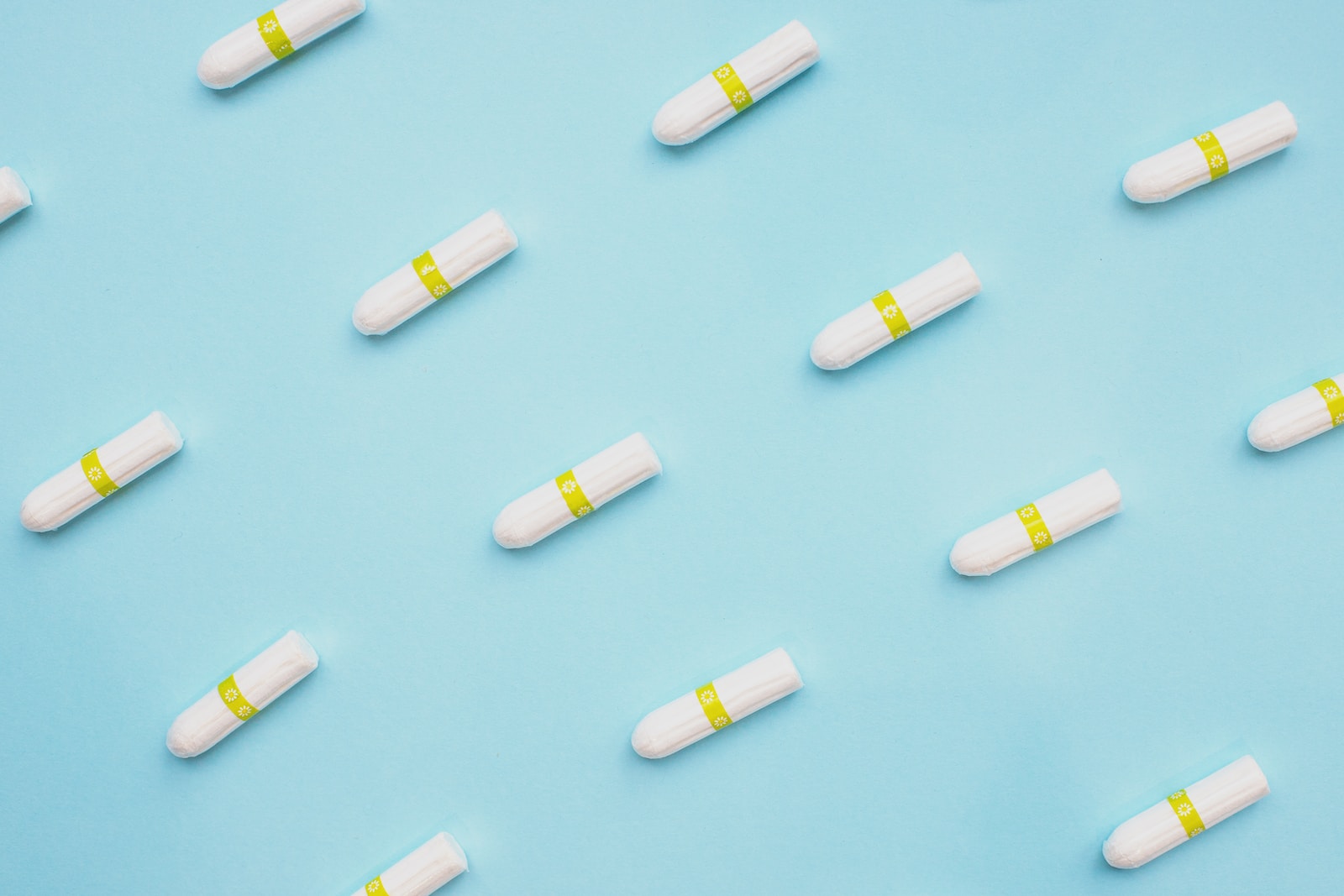 white and yellow medication tampon